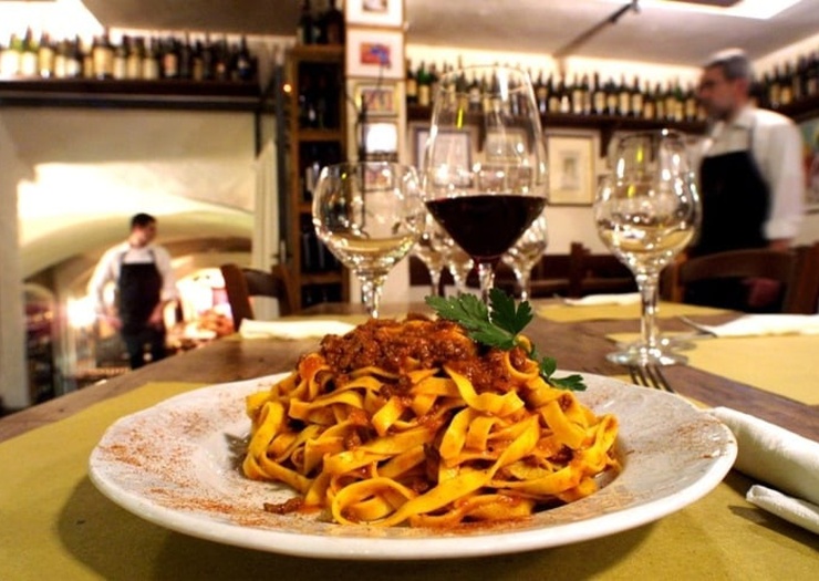 DINNER IN A TYPICAL ITALIAN RESTAURANT Art Hotel Commercianti Bologna DINNER IN A TYPICAL ITALIAN RESTAURANT Art Hotel Commercianti Bologna