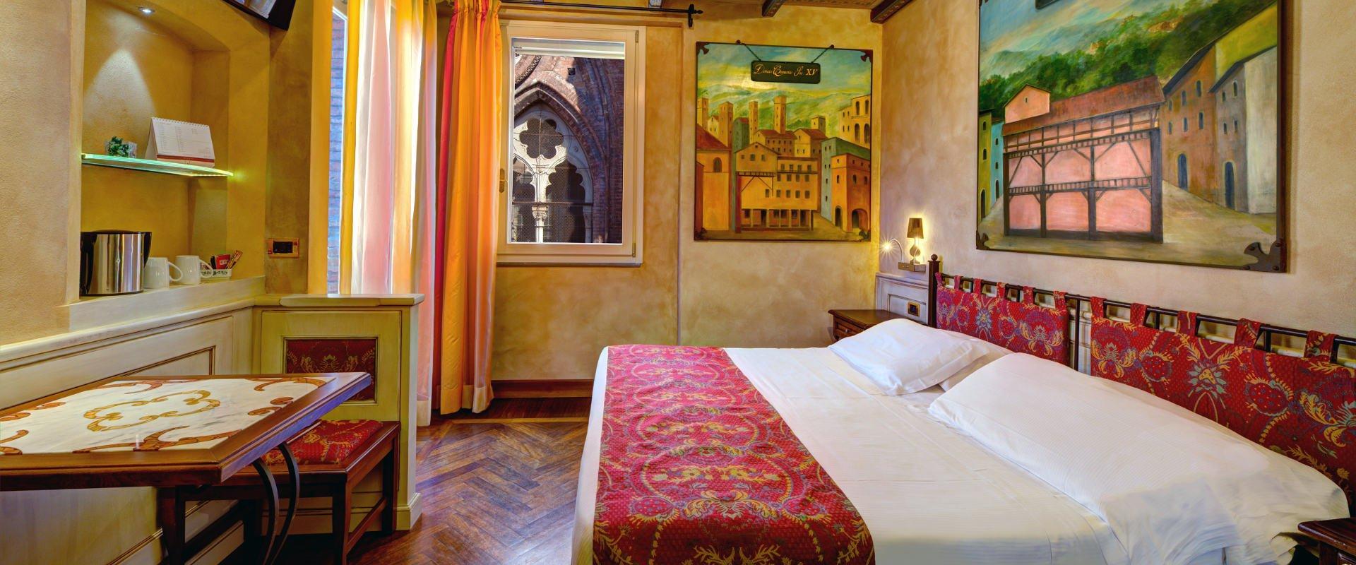 ART HOTEL COMMERCIANTI: A HISTORY WAITING TO BE DISCOVERED Art Hotel Commercianti Bologna ART HOTEL COMMERCIANTI: A HISTORY WAITING TO BE DISCOVERED Art Hotel Commercianti Bologna